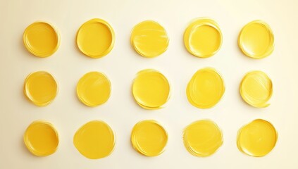 Yellow paint circles on white background.