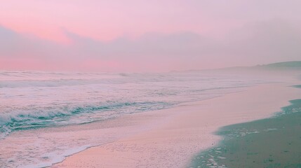 Fototapeta premium Serene Beach at Sunrise with Gentle Waves and Soft Pink Sky