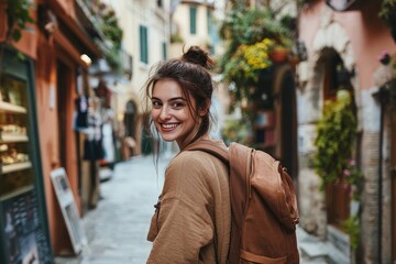 Young caucasian woman exploring charming european street with backpack