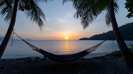 Serene Sunset at Quiet Cove with Hammock Strung Between Palm Trees on Koh Lanta Island
