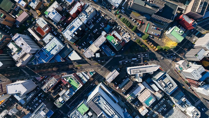 city, aerial view, urban, landscape, scenery, town, street, drone, overhead view, directly above, building, road, society, transportation, traffic, industry, business, automobile, lifestyle, era, mode
