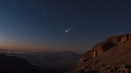 Obraz premium A star-filled night with a hint of a shooting star streaking across the darkness.