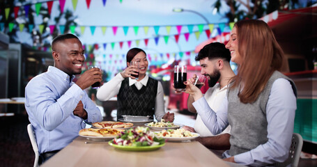 Friends Toast At Local Street Food