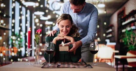 Romantic Couple Sitting Having Dinner
