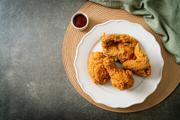 fried chicken with ketchup on plate