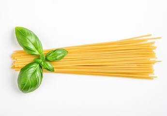 Fresh Green Basil Leaves on Top of Raw Yellow Spaghetti Noodles Isolated on White Background for Culinary and Food Photography Projects