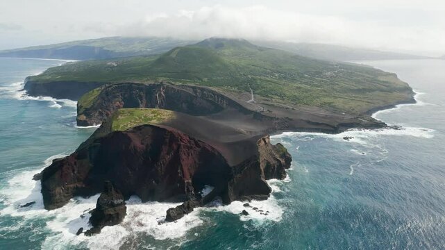 Drone flying over amazing Faial island with Capelinhos Volcano, Azores, Portugal, Europe