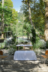 Wedding Decoration Fairy theme outdoors. Fairy theme wedding decoration outdoors. Intimate and private party. Wedding stage with a pool view