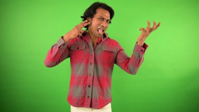 Man is making exaggerated facial expressions