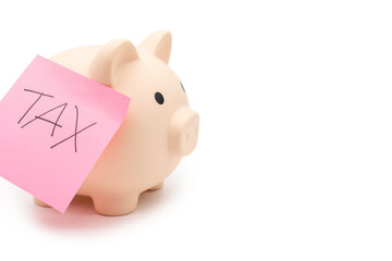 Tax Sticky note with piggy bank, Saving money for tax. Budget, tax, investment, financial, savings. Copy space.
