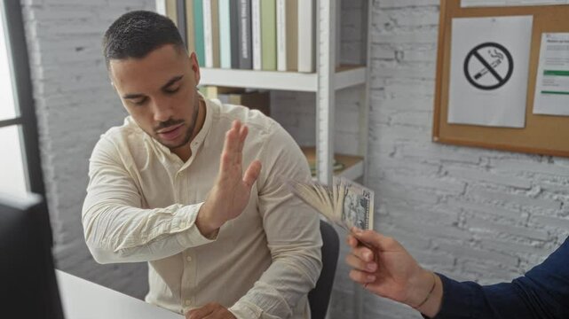 Man rejecting bribe in office showing corrupt business practices with money and handshake, indoor workplace environment