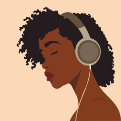 afro person listening to music