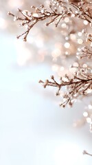 Delicate brown branches with buds, bokeh lights background, winter scene, ideal for holiday greeting cards