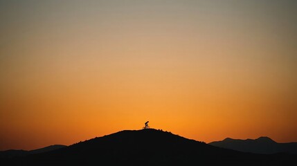 Obraz premium Man riding bike down hill at