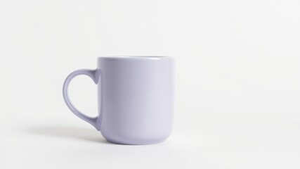 Obraz premium A lavender mug with a curved handle sits on a white surface, ready to be filled with a warm beverage.