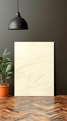 Minimalistic interior with a blank canvas, hanging lamp, potted plant, and wooden floor