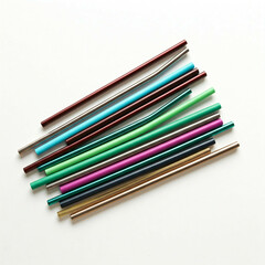 colorful metal drinking straws on white background