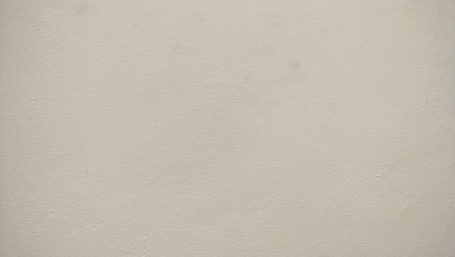 soft brown cement wall texture background. minimalistic, neutral-toned background with a soft beige texture. The surface exudes simplicity and calmness, creating a serene and understated aesthetic