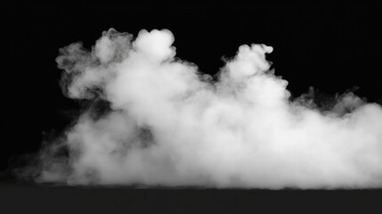 Fototapeta premium Black and white photo of smoke with a white cloud in the middle. The smoke is thick and billowing, creating a sense of movement and chaos. The image evokes a feeling of unease and danger
