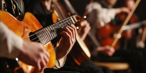 Obraz premium Group of musicians playing instruments, including a guitar, sit together. Scene is one of camaraderie and shared passion for music