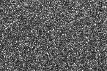 Dark gray glitter texture background. New Year, Christmas and celebration background concept.
