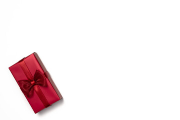 Gift box on white background. Flat lay, top view. Copy space