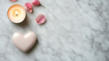 Pink heart, candle, rose petals on marble; romantic background for Valentine's Day card design