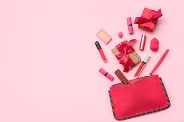 Cosmetic bag with makeup products and gift boxes on pink background. Valentine's day celebration