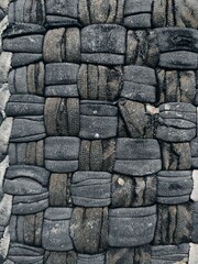 The background texture and pattern of the floor mat are made from white and dark blue patchwork