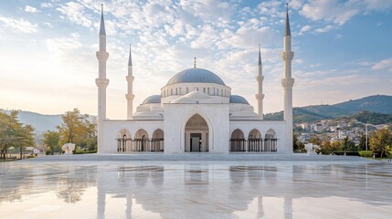 Fototapeta premium Majestic White Mosque Architecture Under a Blue Sky