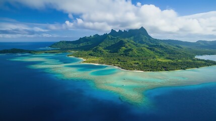 Tropical Island Paradise: An aerial view captures the breathtaking beauty of a lush tropical island, its vibrant green mountains rising dramatically from turquoise waters.