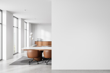 Modern office interior with blank white wall for mockup or design presentation. 3D Rendering