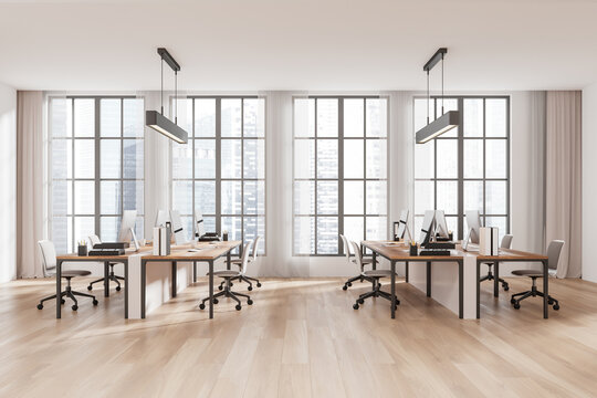 Modern open-space office interior with large windows and wooden flooring. 3D Rendering