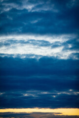 A Beautiful and Dramatic Evening Sky Showcasing Stunning Cloud Layers at Dusk Time