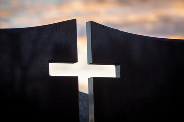 A Cross Emblem set against an Abstract Background, Invoking Profound Deep Thought and Reflection