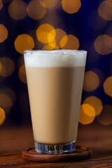 cappuccino in glass on the table with bokeh