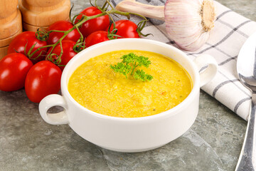 Vegetarian corn cream soup served parsley