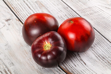 Black ripe juicy organic tomato