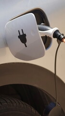 Electric Vehicle Charging Closeup Black White Plug Modern Car