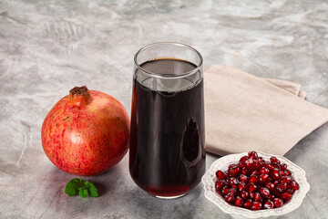 Sweet fresh pomegranate juice with fruit
