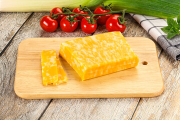 Marble yellow cheese with slices