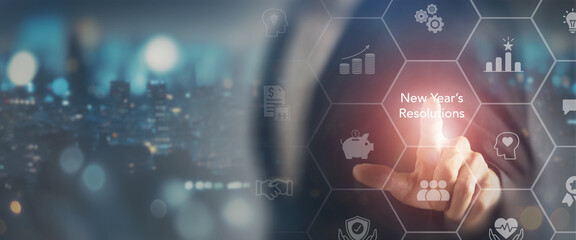 New year's resolutions and  personal goals concept. Touching screen on New year's resolutions. Resolve to continue good practices, change behavior, accomplish a personal goal, improve behavior.