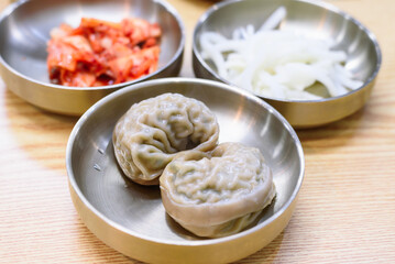 Korean Steamed Dumplings (Mandu) with Traditional Banchan Side Dishes