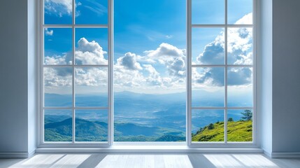 Serene mountain view through large window with blue sky and clouds © Atmospheric stock