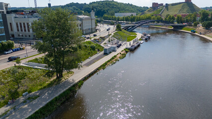 Scenic Riverside with Modern Bridge and Historical Buildings