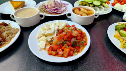 healthy food time in holiday salad 
buffet very fresh life and delicious this a good day. tom yum gai, tuna soup, tuna cream soup, red onion, cucumber, noodle, carrot, eggs, cup, quail eggs.