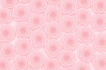 Dense arrangement of pale pink roses with velvety texture