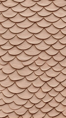 Pink textured wall forms a decorative, scaly pattern, creating a unique and visually appealing design.