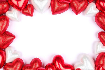 Glittery heart shaped decorations in red and white in circular pattern