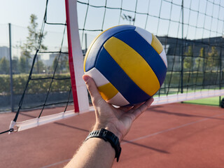Volleyball action. Ball above net during volleyball game. 